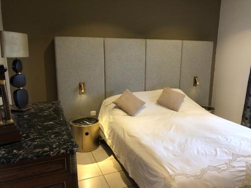 Katil atau katil-katil dalam bilik di Gite de l'Ancheronne 12 couchages spa