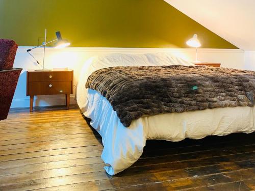 Postel nebo postele na pokoji v ubytování La chambre 1911