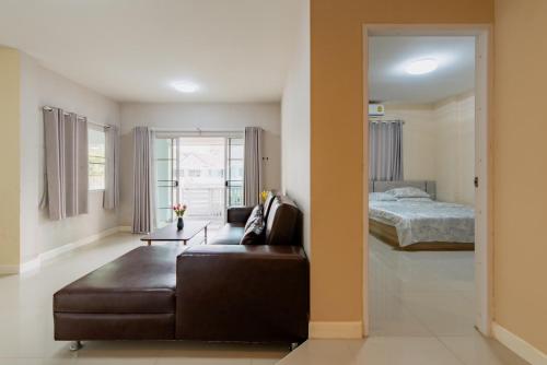 Postel nebo postele na pokoji v ubytování บ้านม่วนใจ๋กรีนวิว