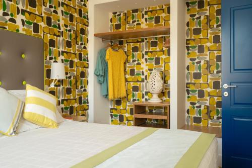 Ένα ή περισσότερα κρεβάτια σε δωμάτιο στο Relais Palazzo del Barone