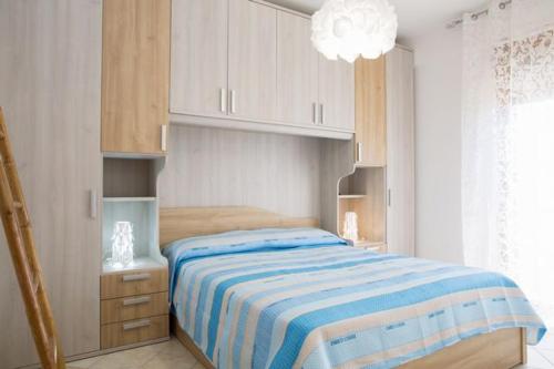 A bed or beds in a room at A Casa di Giovanni