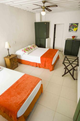 Ένα ή περισσότερα κρεβάτια σε δωμάτιο στο Hotel campestre La Floresta