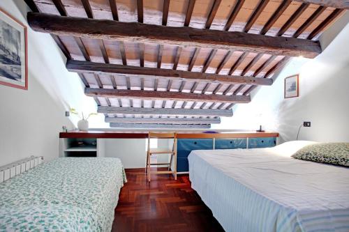 Giường trong phòng chung tại Giudecca