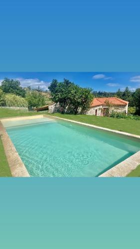 two pictures of a swimming pool at Casa de Cossourado in Cossourado