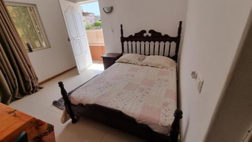 Postel nebo postele na pokoji v ubytování Room in Achada São Filipe, Praia