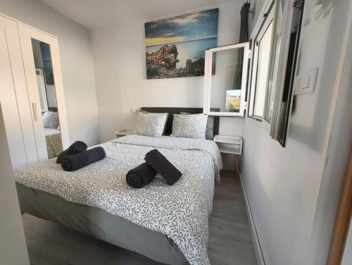 Postel nebo postele na pokoji v ubytování Cozy Studio in Denia