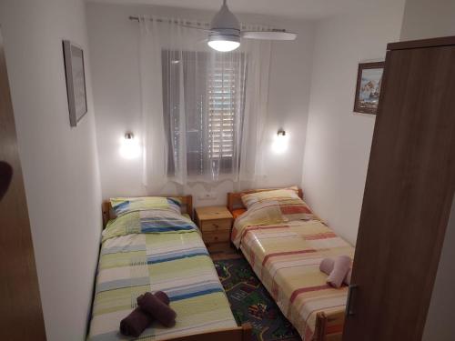 Katil atau katil-katil dalam bilik di Apartments Nagj