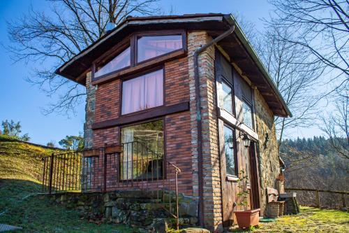 a tiny house on top of a hill at Villa Belvedere in Pieve Fosciana