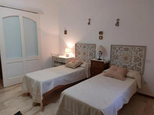 Ένα ή περισσότερα κρεβάτια σε δωμάτιο στο CASA Frau