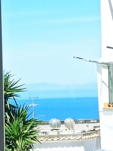 a view of the ocean from the balcony of a house at Villa dei fiori B&B in Capri