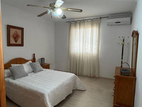 Ένα ή περισσότερα κρεβάτια σε δωμάτιο στο CH Apartamentos Luque