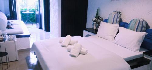 Llit o llits en una habitació de Lassithi Plateau Traditional Hotel Maria