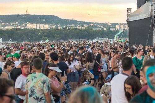 a large crowd of people standing in a crowd at a concert at Marina Varna Apartment-2BDR at South Bay Complex in Varna City