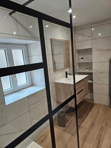 Koupelna v ubytování Le Cabistrou