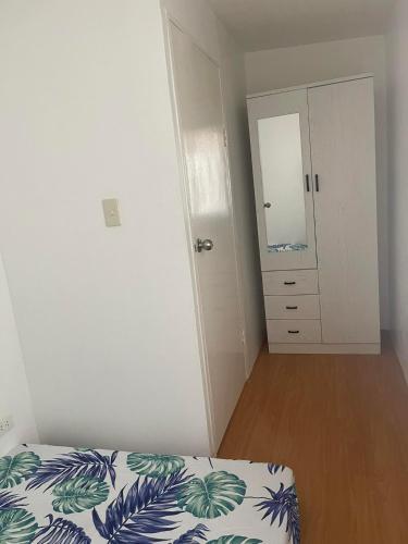 Ένα ή περισσότερα κρεβάτια σε δωμάτιο στο tadzmahal home