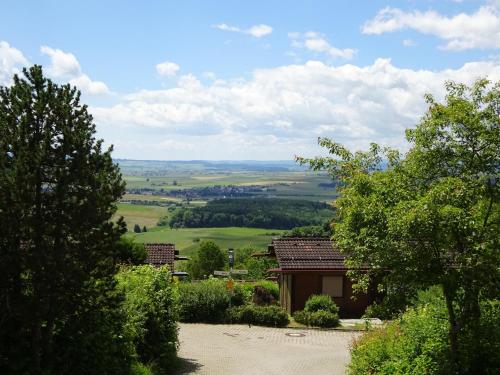a view of the countryside from a house with trees at Villa Leni im Schwarzwald in Bad Dürrheim