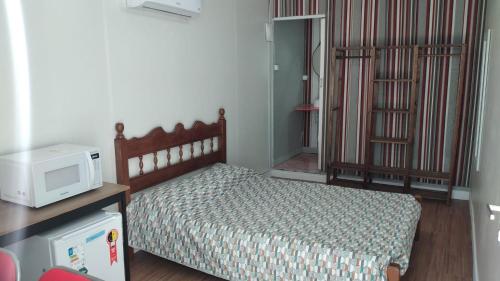 Cama o camas de una habitación en Albergue Cultural Hostel