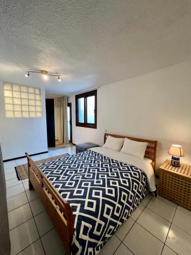 a bedroom with a large bed in a room at Villa Diomedes in Sani Beach
