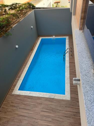 Bazén v ubytování Holiday Apartments TF nebo v jeho okolí