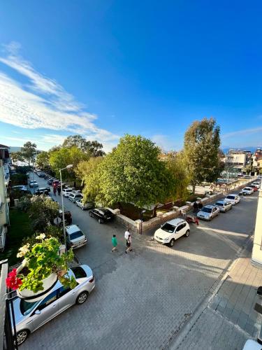 an aerial view of a parking lot with cars parked at MEK HOMEs 2 in Fethiye