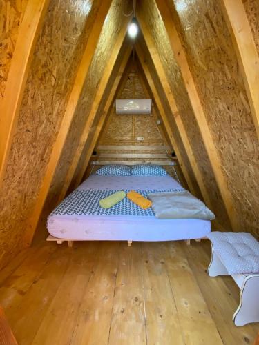 Una cama o camas en una habitación de The Hood - Shkodra Backpackers Hostel & Day Tours