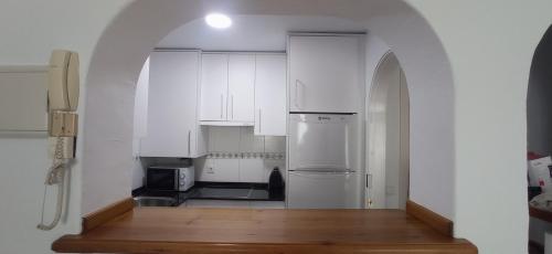 Η κουζίνα ή μικρή κουζίνα στο Atico Duplex con magnificas vistas