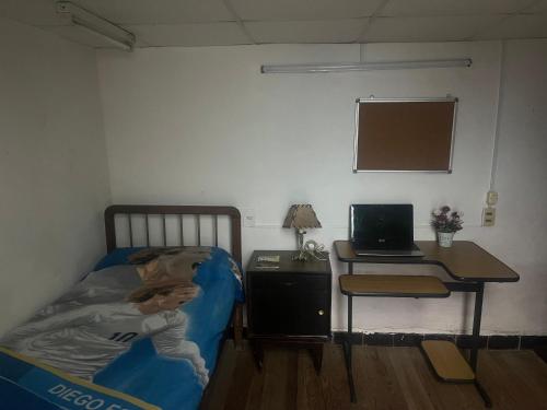 Postel nebo postele na pokoji v ubytování Sweet home Descanso Trabajo Estudio Cerca de todo