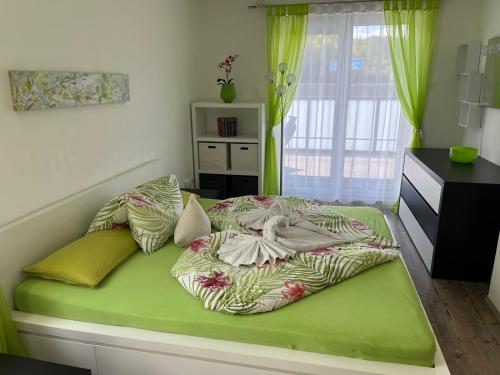 Postel nebo postele na pokoji v ubytování Charmantes Ferienhaus - Velden