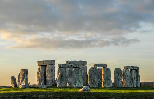 an image of stonehenge with a rainbow in the sky at Salisbury Guest Ąnnex in Salisbury