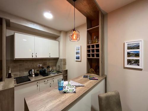 O bucătărie sau chicinetă la Zlatibor - BOYAN - Apartment