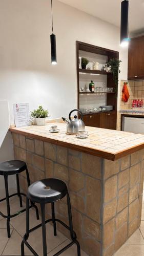 loft style tavernaにあるキッチンまたは簡易キッチン