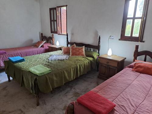 Postel nebo postele na pokoji v ubytování Finca La Viña