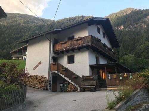 a house with a balcony on the side of it at Haus Ritz-Pitz in Jerzens