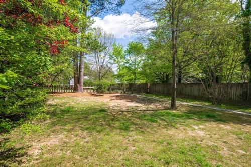 an empty yard with trees and a fence at Private House + Yard Central Location to all RVA in Richmond