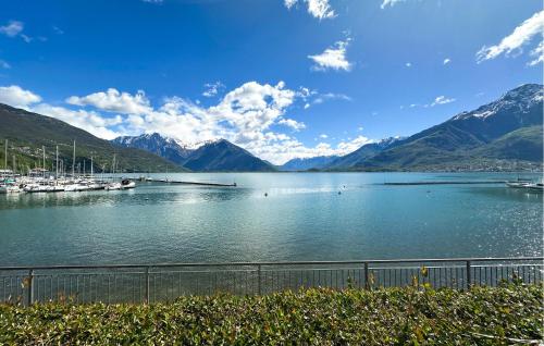 a view of a lake with mountains in the background at 1 Bedroom Beautiful Apartment In Domaso in Domaso