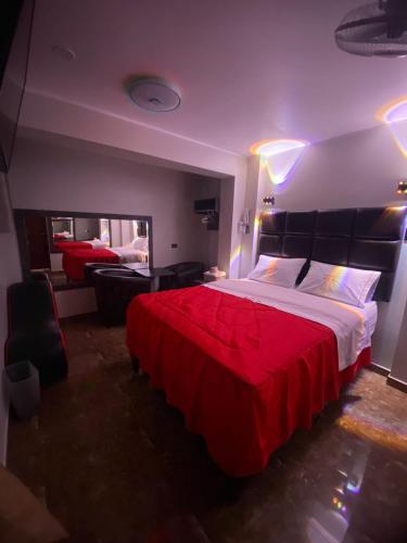 Una cama o camas en una habitación de Hospedaje W ISKAY