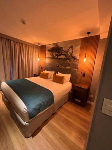 Tempat tidur dalam kamar di Alto Andino Hotel