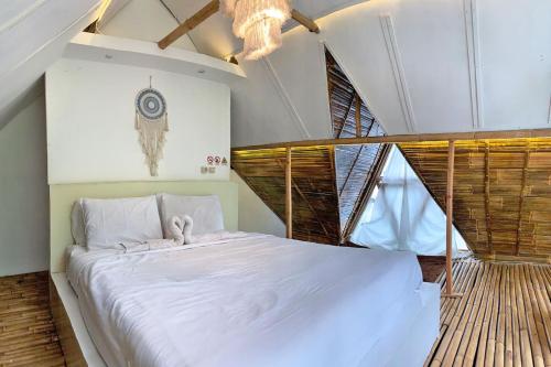 Ein Bett oder Betten in einem Zimmer der Unterkunft Ahmad Lodge Garden View