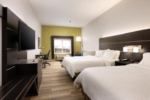 Postel nebo postele na pokoji v ubytování Holiday Inn Express & Suites Chattanooga-Hixson by IHG