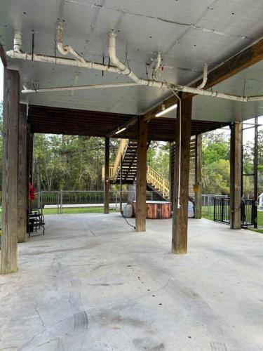 an empty pavilion with a staircase in a park at Bay Breeze Bliss-Hot Tub, Bar and Canal 5mi to Beach in Shoreline Park