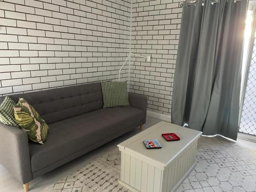 Posezení v ubytování Modern studio with private patio