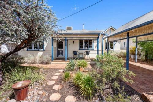 a house with a porch and a patio at Home in Lamington in Kalgoorlie