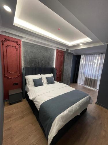 Lova arba lovos apgyvendinimo įstaigoje DOLCE COMFORT SUİTES HOTEL