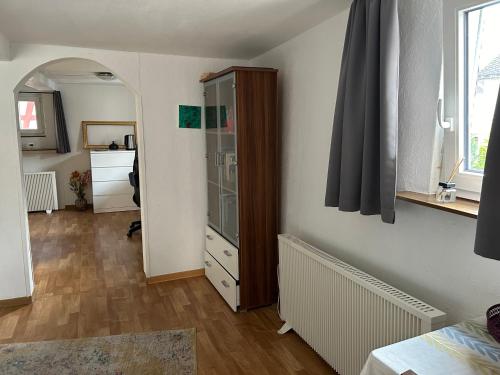 Ένα ή περισσότερα κρεβάτια σε δωμάτιο στο Privatzimmer mit eigenem Bad und Blick auf den Rhein