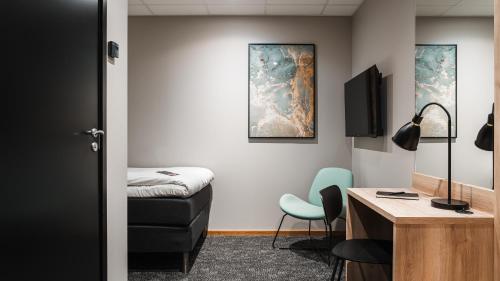 Μια τηλεόραση ή/και κέντρο ψυχαγωγίας στο Comfort Hotel Skellefteå