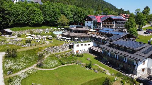 an aerial view of a resort with a large building at LANIG Hotel Resort&Spa - Wellness und Feinschmeckerhotel - family owned and managed in Oberjoch