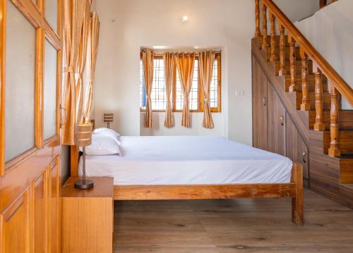 Ένα ή περισσότερα κρεβάτια σε δωμάτιο στο Sundew-n-Lake