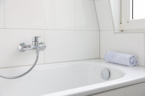 a sink with a shower in a bathroom at Apartment in Schwerte in Schwerte