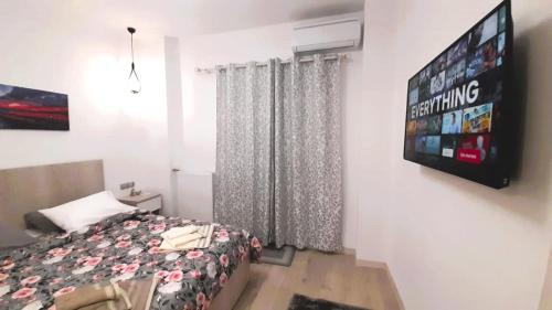 Letto o letti in una camera di The Golden home 1