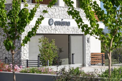 a sign on the front of a building at ENARIA in Nafplio